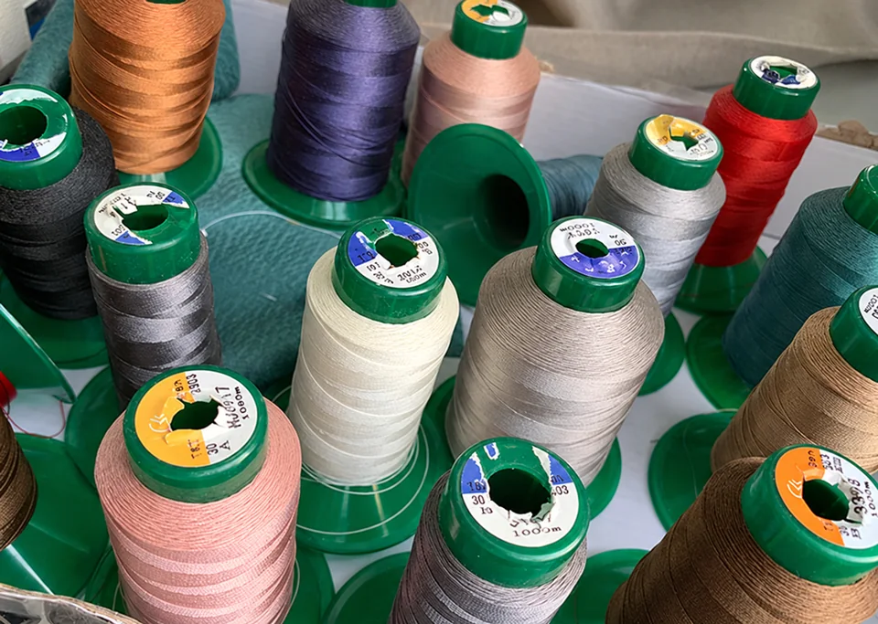 A selection of thread cones in neutral and coloured shades